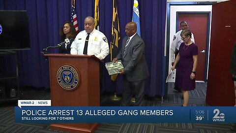 Police arrest 13 alleged gang members, search continues for seven others