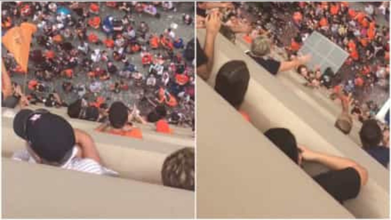Adeptos dos Houston Astros juntam-se para devolver chapéu a mulher