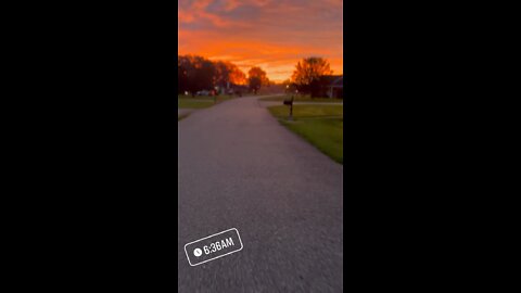 Mr Sunshine on an electric skateboard