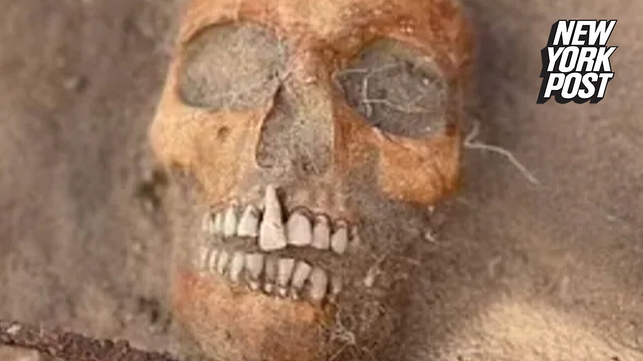 'Vampire child' corpse is discovered in Polish cemetery with triangular padlock attached to it