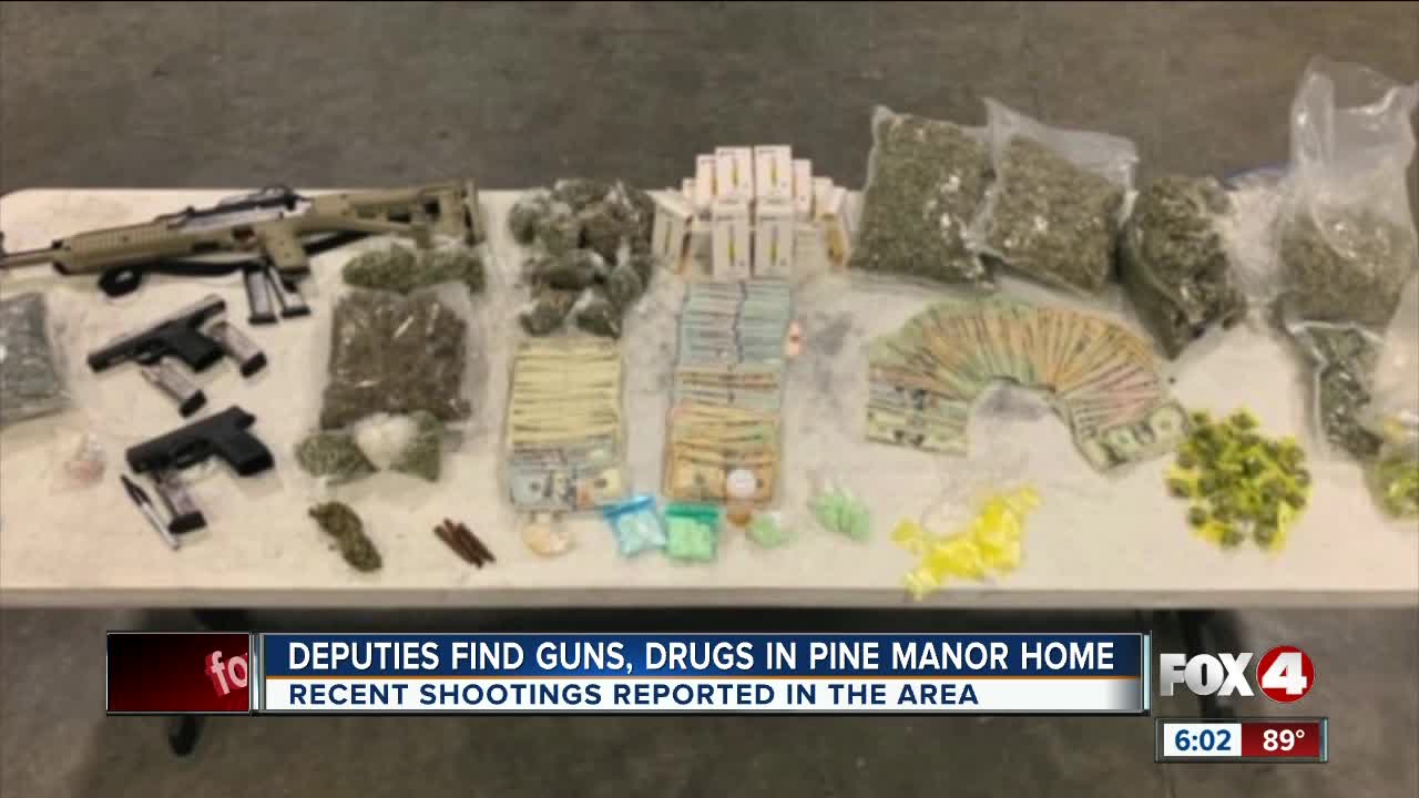 Seven charged after drugs and guns found in Pine Manor home