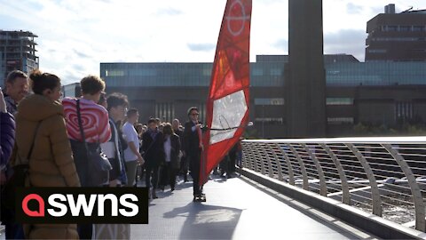 Commuter windsurfed his way around London in protest at the cost of the new ULEZ car tax