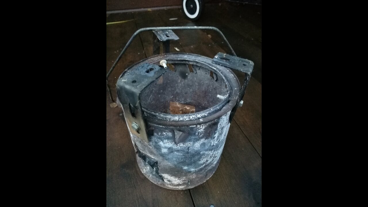 Relaxing by the fire from my Bucket Stove.