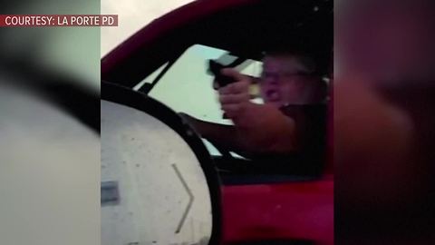 Woman accused of pointing fake gun at motorists to get through traffic