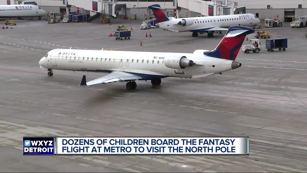 Dozens of children board fantasy flight to North Pole