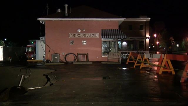 Massive sink hole opens on Main Street in East Aurora