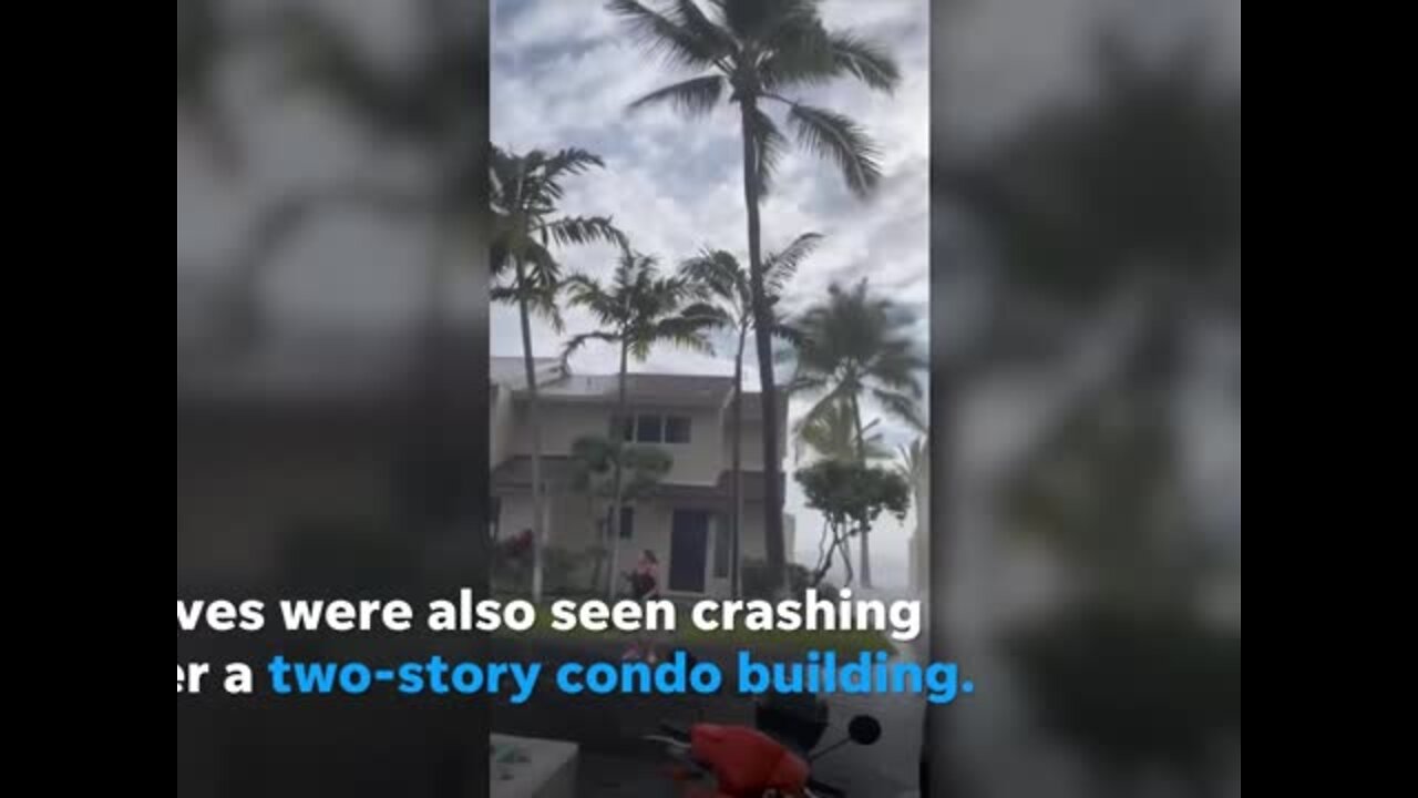 Giant waves in Hawaii crash the party during wedding reception.