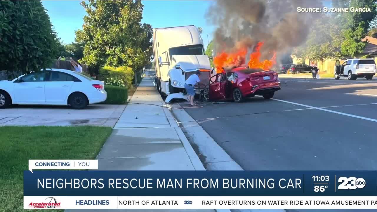 Neighbors rescue man from burning car