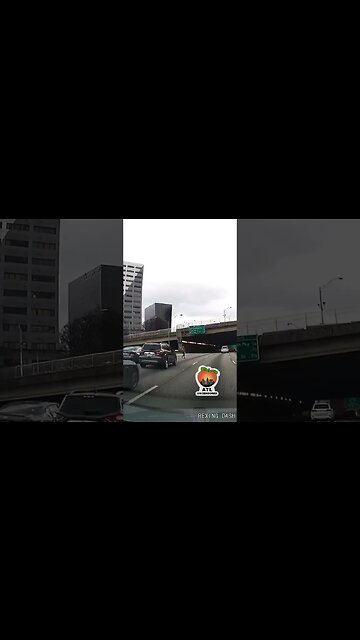 Woman In Atlanta Decides its a good idea to walk across the Highway
