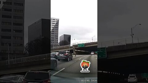 Woman In Atlanta Decides its a good idea to walk across the Highway