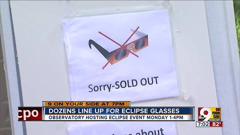 Dozens line up for eclipse glasses