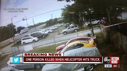 Video captures helicopter crash onto busy Tampa highway