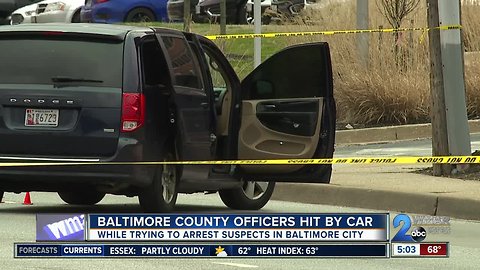 Two Baltimore County officers hit by car while trying to arrest suspect in city