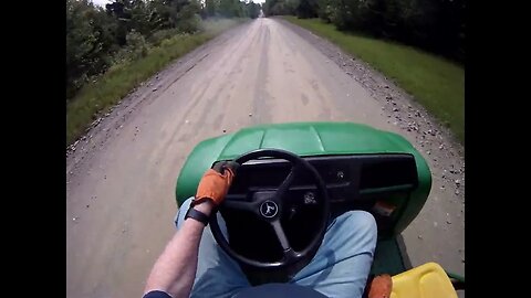 John Deere Gator 6x4 a little muddy, trip around in some dew soaked grass to free up some mud.