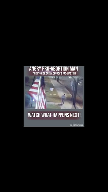 An angry pro-abortion man tries to kick over a church's pro-life sign. Watch until the end!