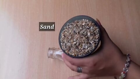 Beautiful Bottle Decoration With Rice and Sand