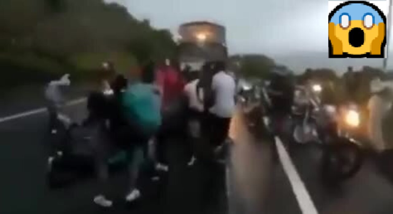 Crazy dancing people Jammed Huge Truck on highway