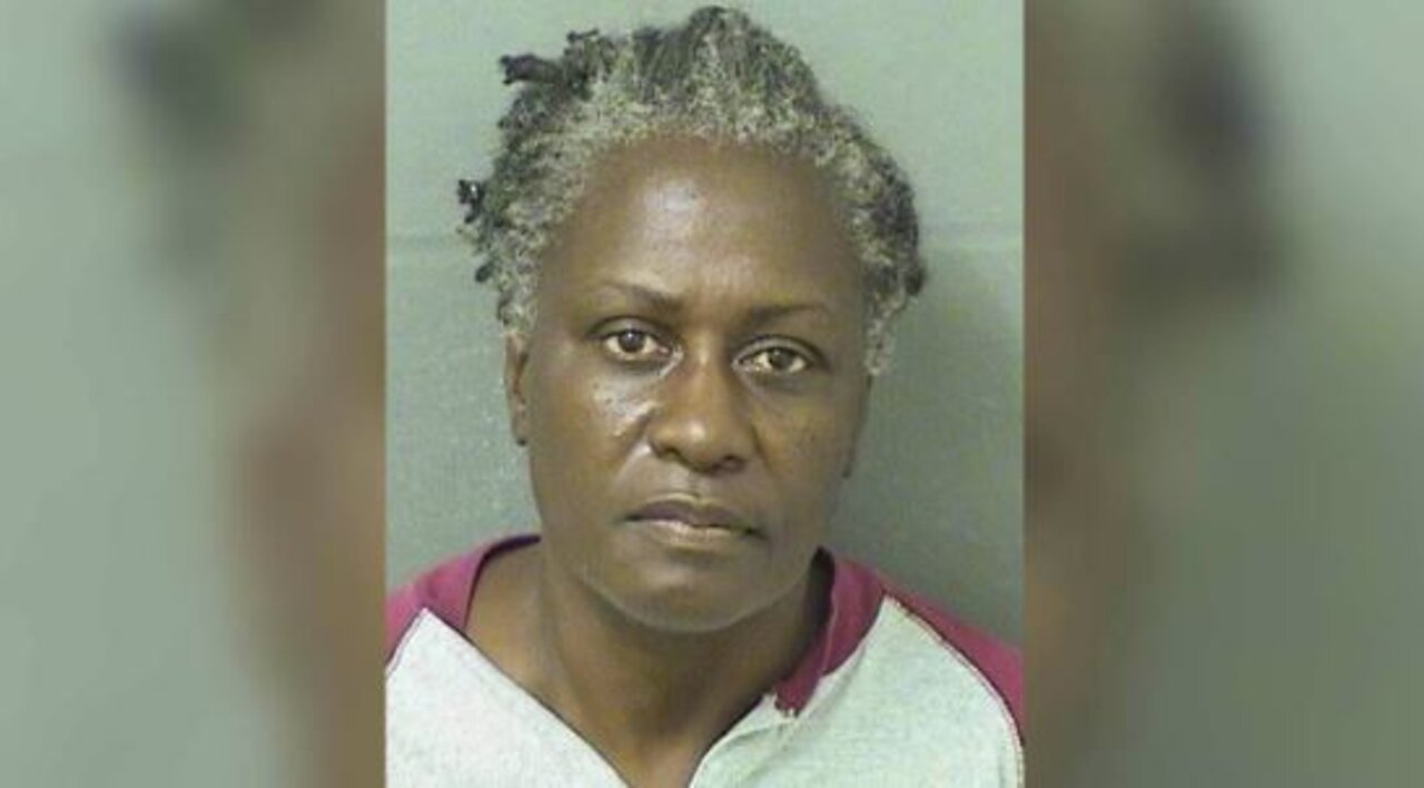 Woman charged with throwing hot water on worker