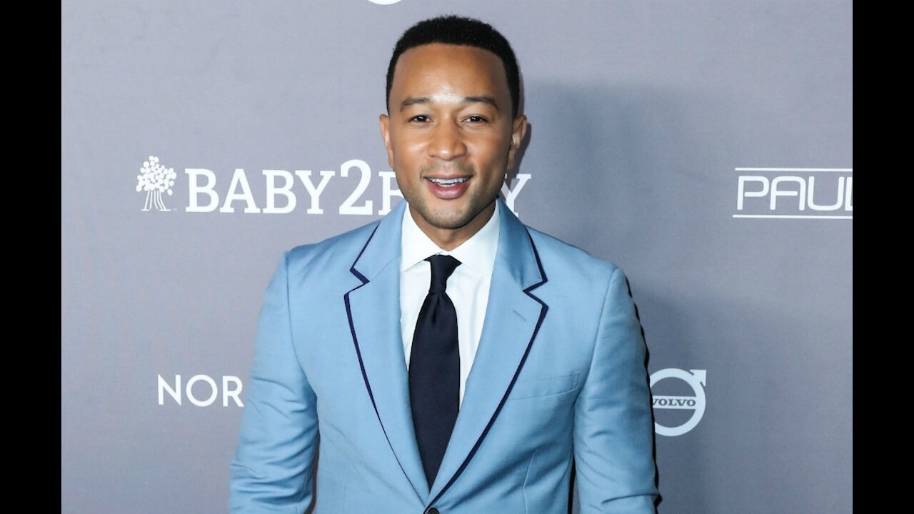 John Legend has an impressive robe collection