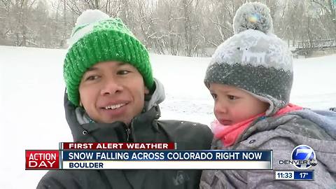 Boulder residents loving the snow despite slick conditions
