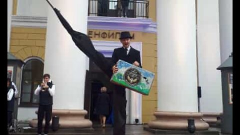 Stilt walker stumbles on red carpet