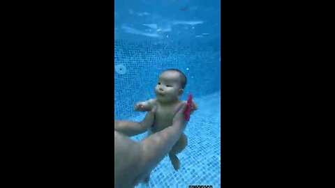 Cute Baby swimming in pool 🌞