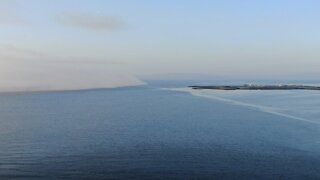 Drone captures fog rolling in at Galway Bay in Ireland