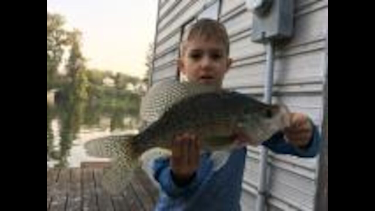 Kid catches MONSTER Crappie