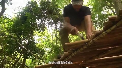 Jungle craft builds cabins from abandoned timber..9