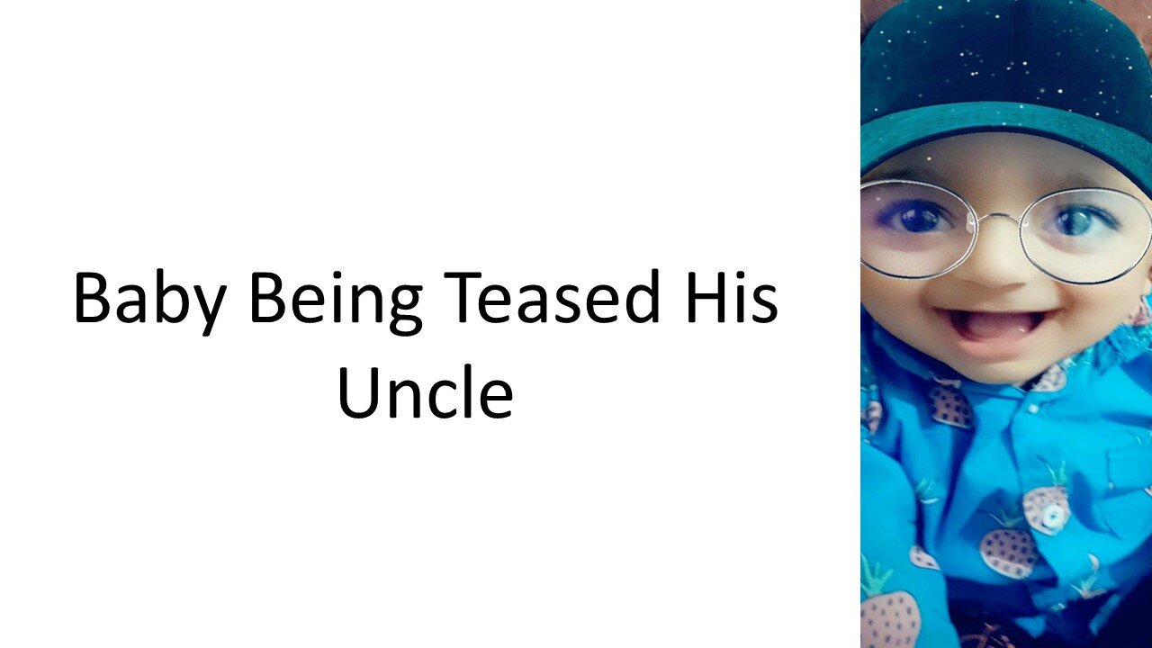 Baby Being Teased By His Uncle