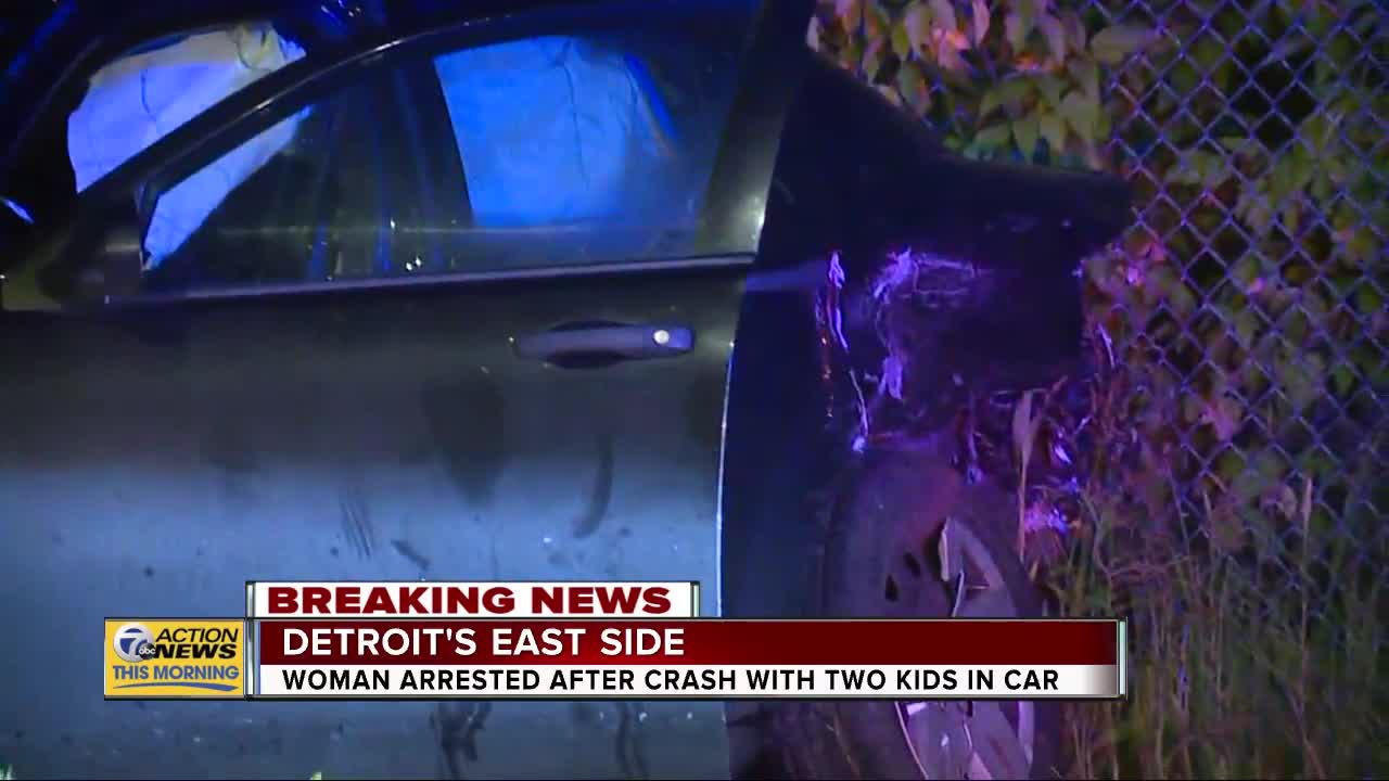 Woman arrested after crash with two kids in car in Detroit