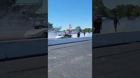 Pair of fast Trans-ams light up the tires and ready to race