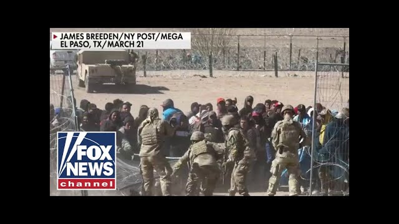 Nine migrants charged with assault, inciting a riot after storming border