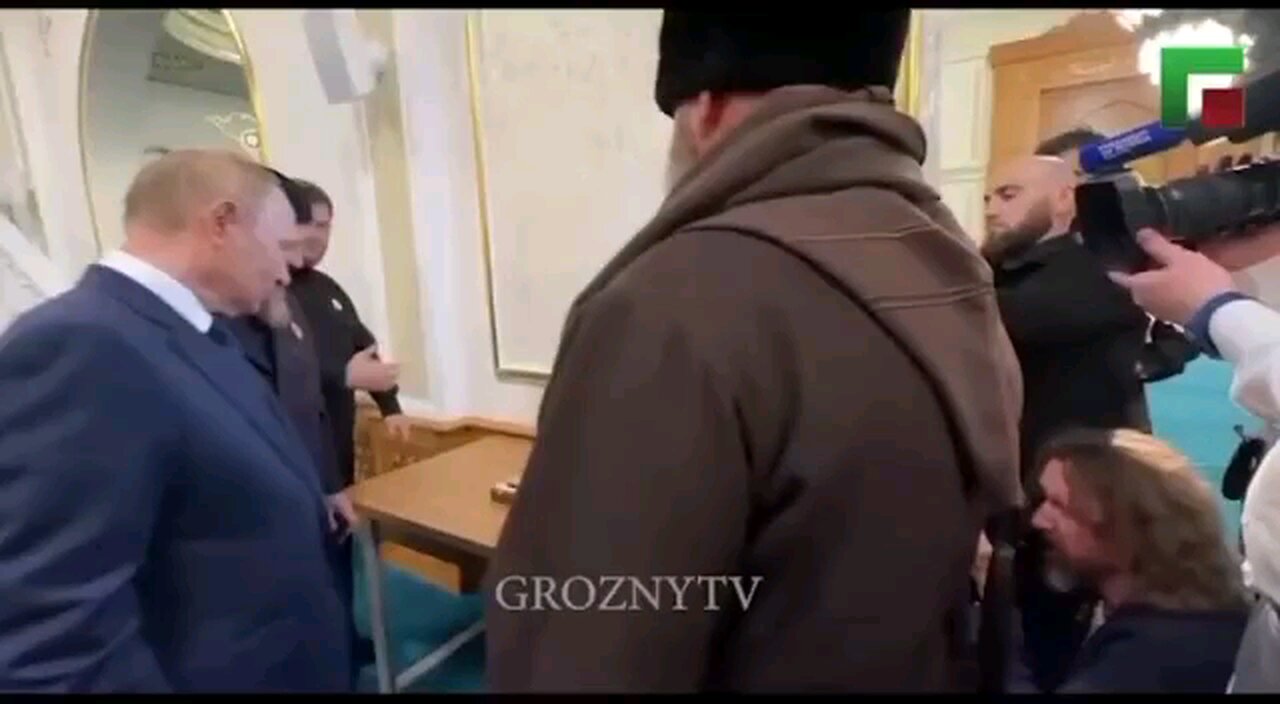 Putin visiting a new Mosque in Chechnya and Kissing A Quran! Is Russia going Muslim next?