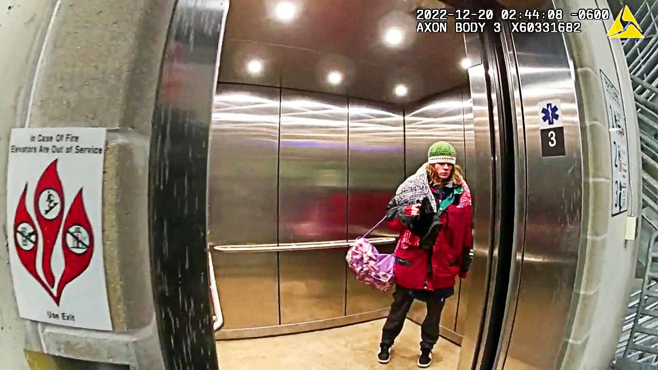 Police Surprise Disorderly Woman as Elevator Opens