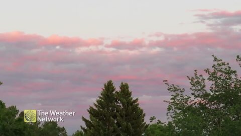 Blue and pink cotton candy clouds fill the sky in Weyburn, SK