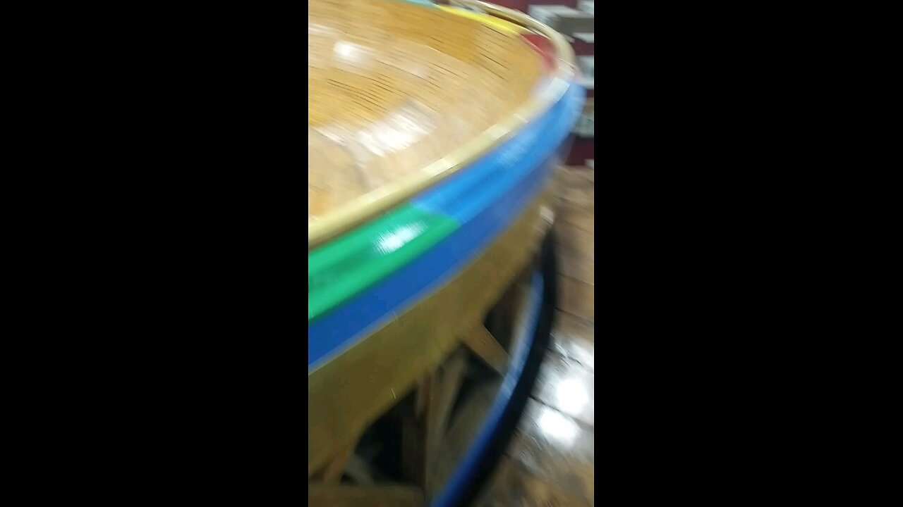 wasting money into a giant pit in Arnold's Park Iowa