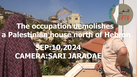 Zionists Demolish a Palestinian house in a village north of Hebron, West Bank of Palestine.