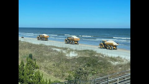 Dune restoration has started! Dodged a bullet !! 🚚