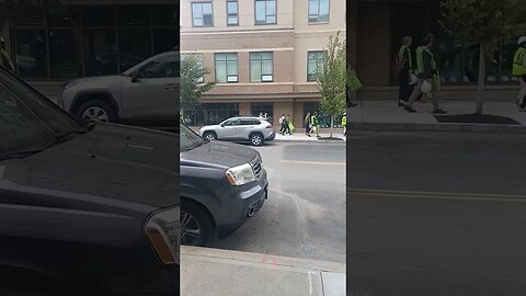 Work is checking out the new building on Washington street.