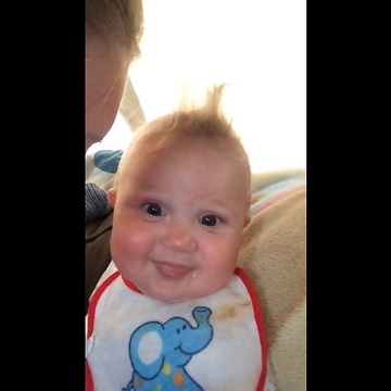 Mom and baby have raspberry blowing competition