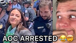 AOC acts like she is ARRESTED (fake handcuffs: she's loving the attention, photo op)