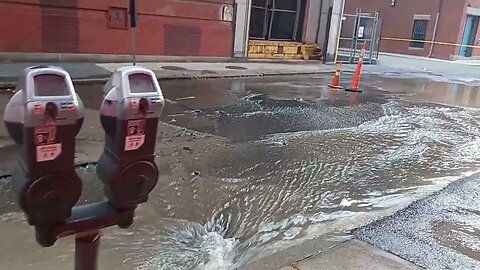 Boston Fire Department in water and sewer respond to a water main break in the Back Bay