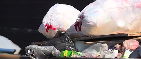 Trash piles up at apartment complex