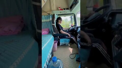 Chinese Girl Trucking Down The Road