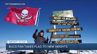 Bucs fan raises the flag after summiting Mount Kilimanjaro ahead of Super Bowl LV