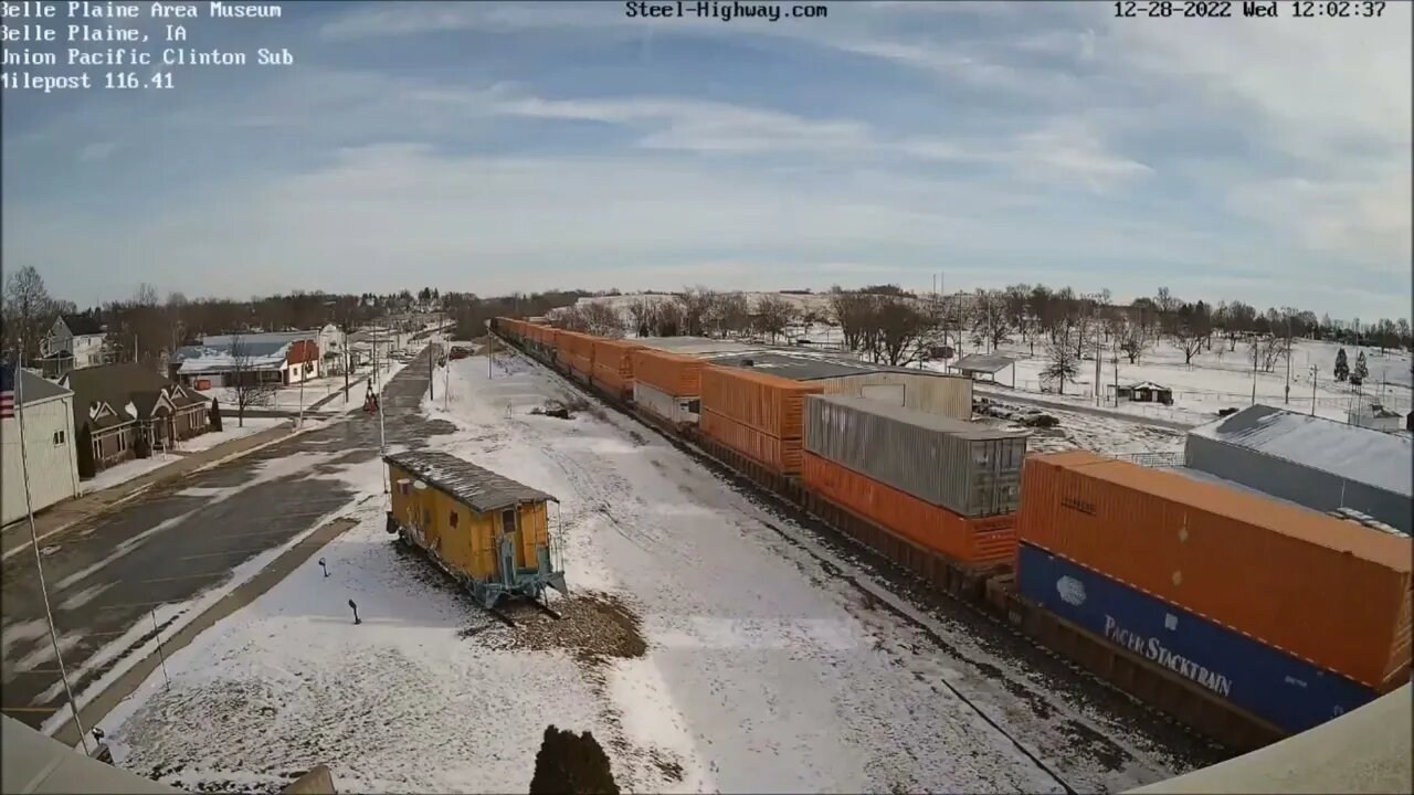 EB Intermodal with EX SP and NS at Carroll and Belle Plaine, IA on December 28, 2022