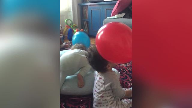 Cute Twin Boys Meet Balloons