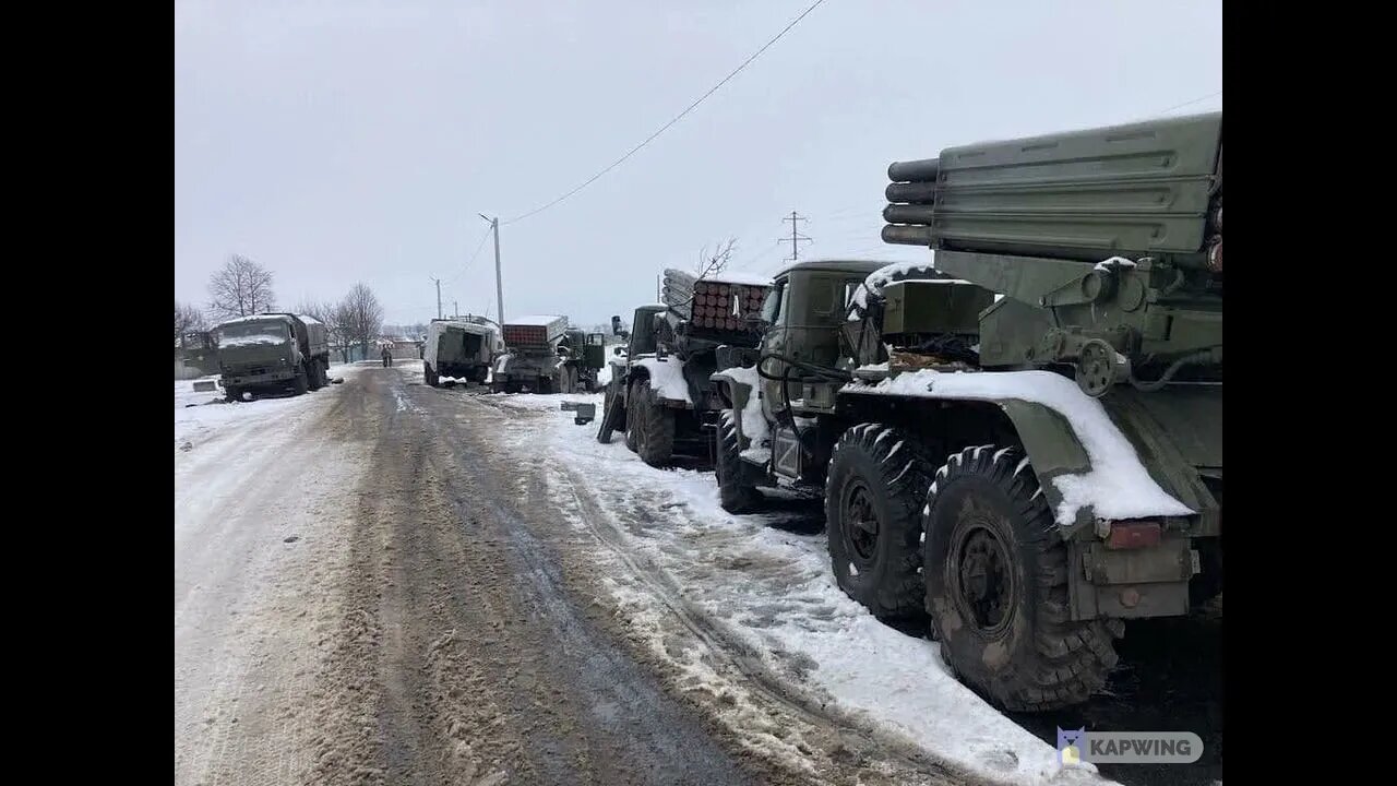 Abandoned Russian BM-21 Grads (Z sign on side of one) line the roads (no video--image only)