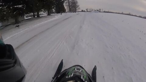 Snowmobiler Escapes Attack from Wild Dog